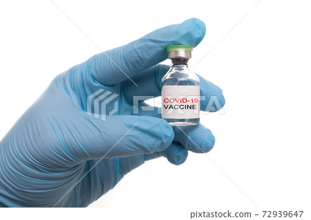 doctor holding COVID-19 vaccine. Healthcare And Medical concept. doctor holding COVID-19 vaccine. Healthcare And Medical concept. 72939647