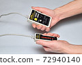 Hands of the installer Ethernet LAN check tester for twisted pair 72940140