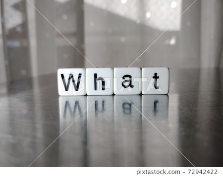 Dice letter 2 lined up with What in bright light 72942422