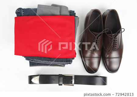 Classic men's brown shoes, belt and clothes on white background Classic men's brown shoes, belt and clothes on white background 72942813