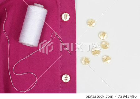 sewn with a needle with white thread pearl buttons on the shirt 72943480