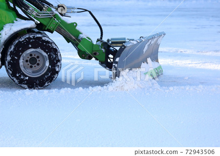 street cleaning the city from snow with the help of special equipment mini. street cleaning the city from snow with the help of special equipment mini. 72943506