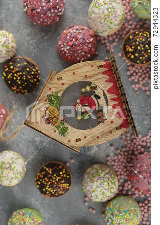 Colorful sweet chocolate small doughnuts with sprinkles 72944323