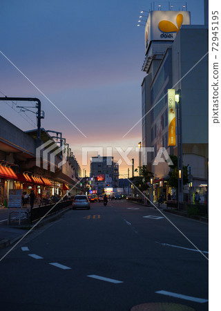 Cityscape at dusk, in front of Hankyu Sone Station Cityscape at dusk, in front of Hankyu Sone Station 72945195