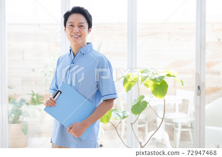 Portrait of a male caregiver 72947468