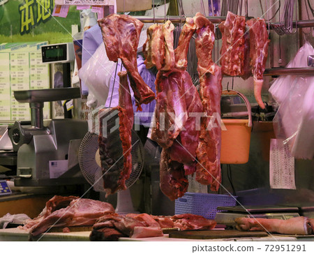 Pork sold at a butcher shop in the Hong Kong market. Higher and more expensive than beef and chicken. Chinese love pork 72951291