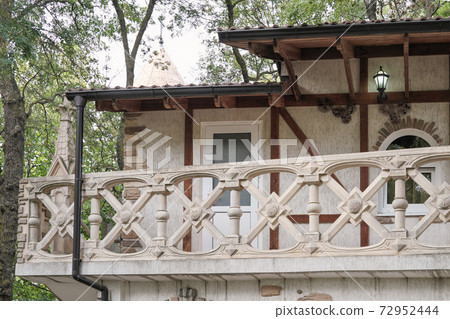old house balcony. classic style house in a park. old house balcony. classic style house in a park. 72952444