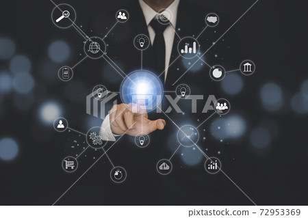 Photo Businessman touchscreen on the graph Screen Icon of a media screen, Technology Process System Business with Communication and marketing concept. 72953369