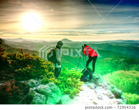 Travel Lifestyle and photography concept rear view. Photographer travelers 72954316