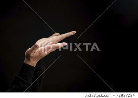 Woman's hand praying and worship to GOD Using hands to pray in religious beliefs and worship christian in the church or in general locations in vintage color tone or copy space. Woman's hand praying and worship to GOD Using hands to pray in religious beliefs and worship christian in the church or in general locations in vintage color tone or copy space. 72957284