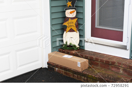 Box delivered to side door by driveway in December Box delivered to side door by driveway in December 72958291