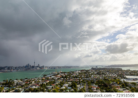 Dark cloud over Auckland skyline Dark cloud over Auckland skyline 72958506