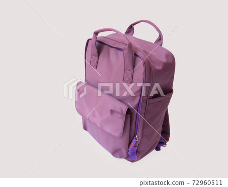 Purple suitcase with isolated on gray background 72960511