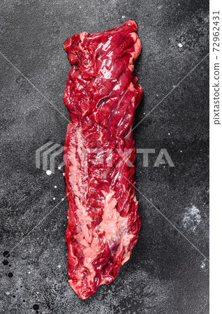 Raw top blade, Denver steak. Black background. Top view. 72962431