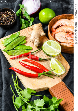 Recipe and ingredients Tom Kha Gai. Thai galangal chicken soup in coconut milk. Black background. Top view 72962553