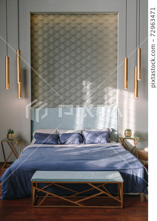 Wealthy rich room. Glamorous, elegant baroque dream bedroom design interior. Turquoise, blue colour, no people. Bathrobes on the bed, pillows Wealthy rich room. Glamorous, elegant baroque dream bedroom design interior. Turquoise, blue colour, no people. Bathrobes on the bed, pillows 72963471