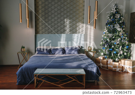 Christmas tree in luxury contemporary bedroom Christmas tree in luxury contemporary bedroom 72963473