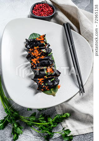 Black Dim sum dumplings. Asian cuisine. Gray 72965138