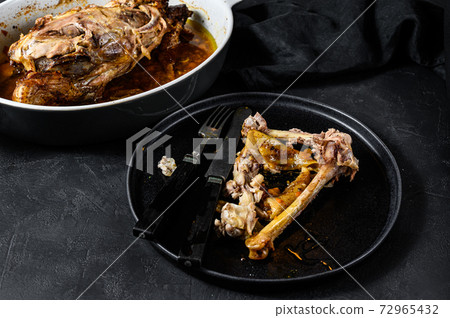 A plate of chicken bones and a chicken skeleton in A plate of chicken bones and a chicken skeleton in 72965432