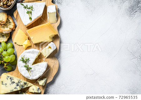 Cheese Board with French Camembert, brie, Parmesan Cheese Board with French Camembert, brie, Parmesan 72965535