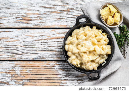 American mac and cheese, macaroni pasta in cheesy American mac and cheese, macaroni pasta in cheesy 72965573