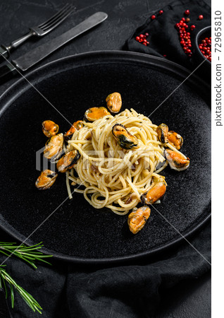 Homemade Pasta Spaghetti with mussels, tomato Homemade Pasta Spaghetti with mussels, tomato 72965810