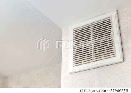 Dirty ventilation grille in the kitchen on the wall. Communication in the kitchen. 72966286