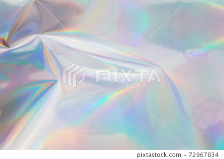 Rainbow halographic wrinkled foil background. Abstract pastel color background. 72967834
