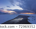 Iceland River leading into the distant sunset 72969352