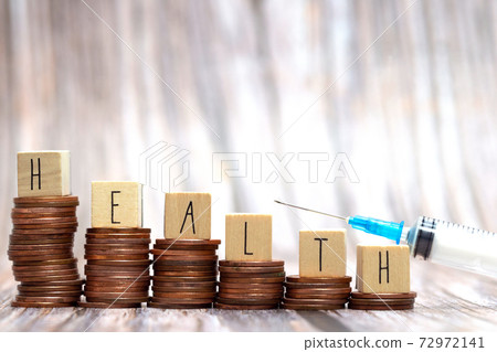 Word HEALTH on step stacked coins with syringe for injection, Money savings or investment planning for life insurance and healthcare concept. Word HEALTH on step stacked coins with syringe for injection, Money savings or investment planning for life insurance and healthcare concept. 72972141