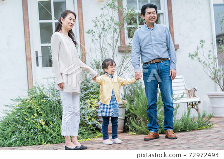 Grandparents taking care of their grandchildren Grandparents taking care of their grandchildren 72972493