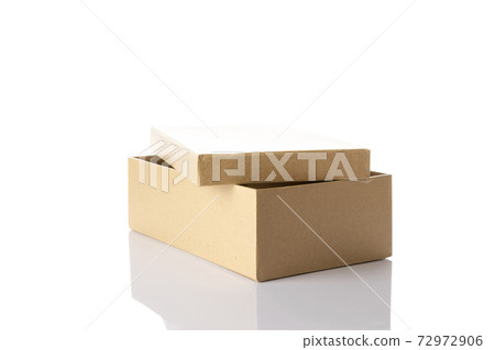 Mockup box paper. Brown cardboard carton package for shipping delivery isolated on white background. Closed craft paper object mockup for design. 72972906