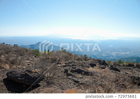 Kirishima Onamiike mountain trail seen from Karasuhatake and Kirishima city area 72973681