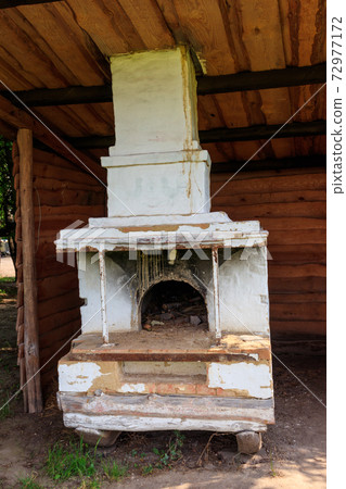 Traditional ukrainian ancient outdoor stove in the yard Traditional ukrainian ancient outdoor stove in the yard 72977172