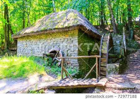 Old watermill in Pyrohiv (Pirogovo) village near Kiev, Ukraine Old watermill in Pyrohiv (Pirogovo) village near Kiev, Ukraine 72977188