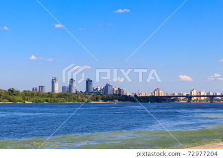 View of Paton bridge and the Dnieper river in Kiev, Ukraine View of Paton bridge and the Dnieper river in Kiev, Ukraine 72977204