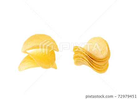two heap of crispy potato chips isolated on a white background. two heap of crispy potato chips isolated on a white background. 72979451