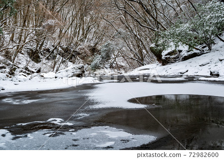 Snow and ice landscape of Kikuchi Gorge in winter Snow and ice landscape of Kikuchi Gorge in winter 72982600