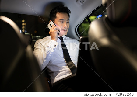 businessman work in car 72983246