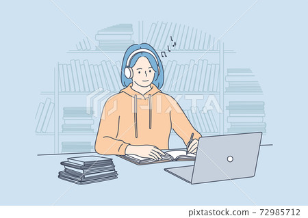 Using gadgets, listening to music during e-learning concept 72985712