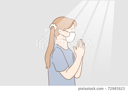 Little girl praying at home during pandemic concept Little girl praying at home during pandemic concept 72985823