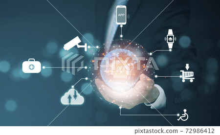 Hand holding earth connect with icon and  Artificial Intelligence (AI),on big data network machine learning on the dark background, artificial intelligence technology, innovation and futuristic. 72986412