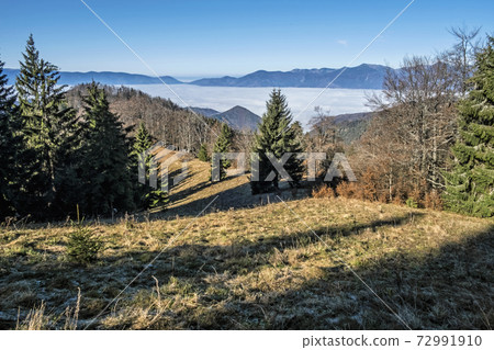 Big Fatra mountains and Turiec basin, Slovakia, inverse weather scene Big Fatra mountains and Turiec basin, Slovakia, inverse weather scene 72991910