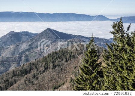 Big Fatra mountains and Turiec basin, Slovakia, inverse weather scene Big Fatra mountains and Turiec basin, Slovakia, inverse weather scene 72991922
