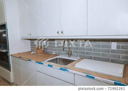 Remodel home improvement view installed in a new kitchen Remodel home improvement view installed in a new kitchen 72992261