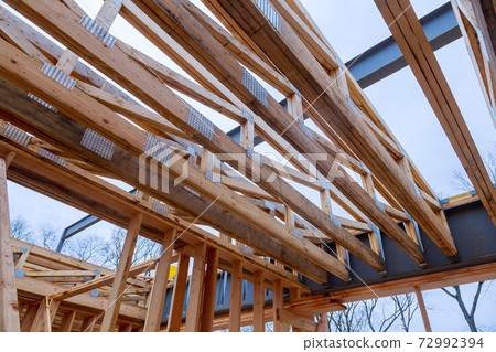 New home construction framing of a house under construction 72992394