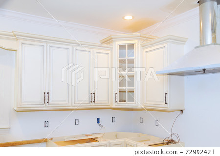 White of kitchen wooden cabinets with contemporary 72992421