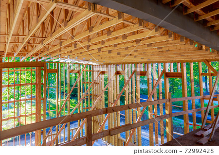 New home construction framing of a house under construction 72992428