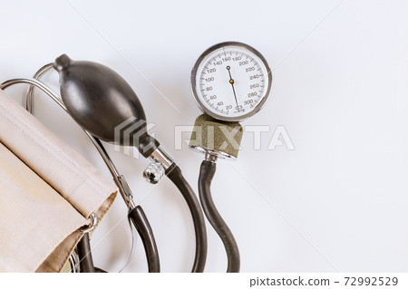 Mechanical tonometer closeup medical device on a white background Mechanical tonometer closeup medical device on a white background 72992529
