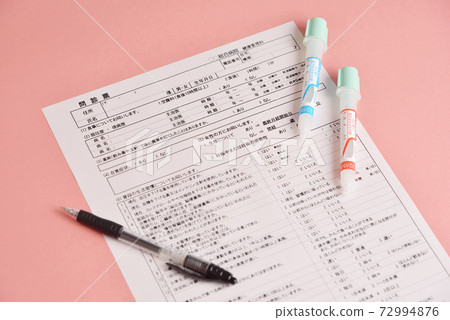 Preparation for health checkup: Questionnaire, colorectal cancer test kit, and ball pen Preparation for health checkup: Questionnaire, colorectal cancer test kit, and ball pen 72994876